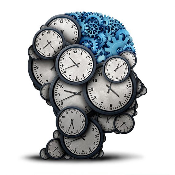 Illustrated time concept as a group of clock objects shaped as a human head with gears and cog wheels as the brain.